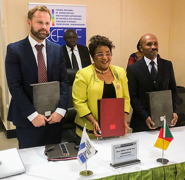 Signing ceremony with representatives from IDI, CREFIAF, and SAI Madagascar